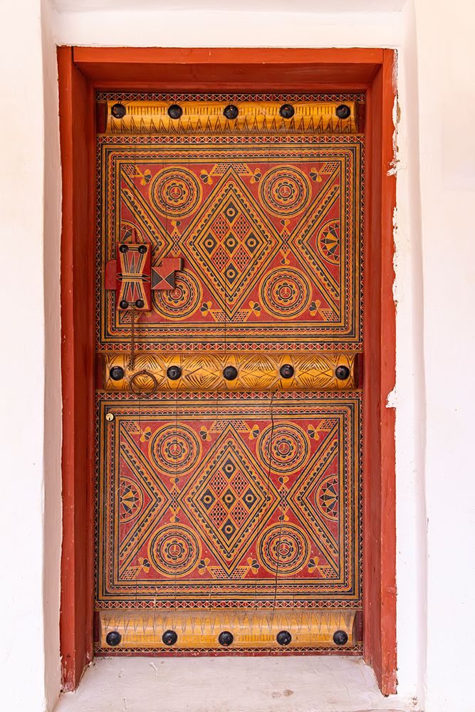 Saudi Arabia, Al-Qassim, Unaizah. Colorfully painted door. art print by Emily M. Wilson for $57.95 CAD