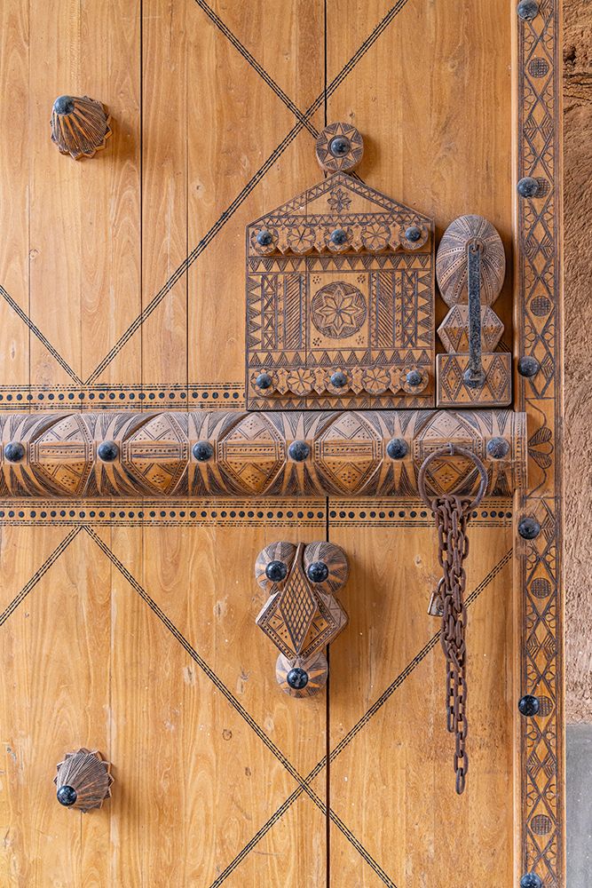 Saudi Arabia, Al-Qassim, Unaizah. Decoratively carved wooden door. art print by Emily M. Wilson for $57.95 CAD