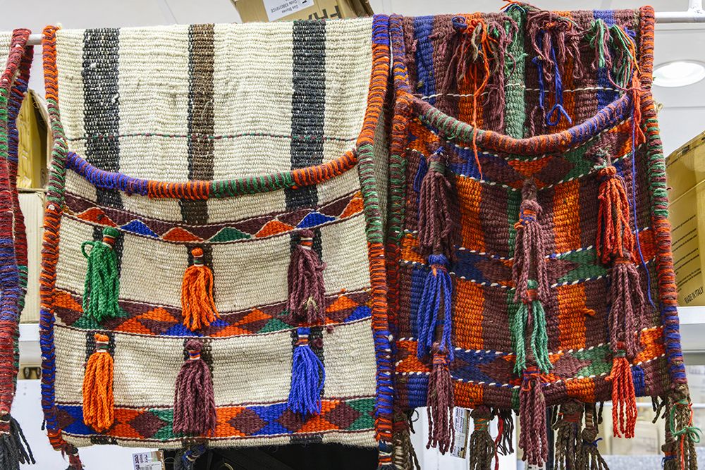 Saudi Arabia, Tabuk. Hand bags for sale at the market. art print by Emily M. Wilson for $57.95 CAD