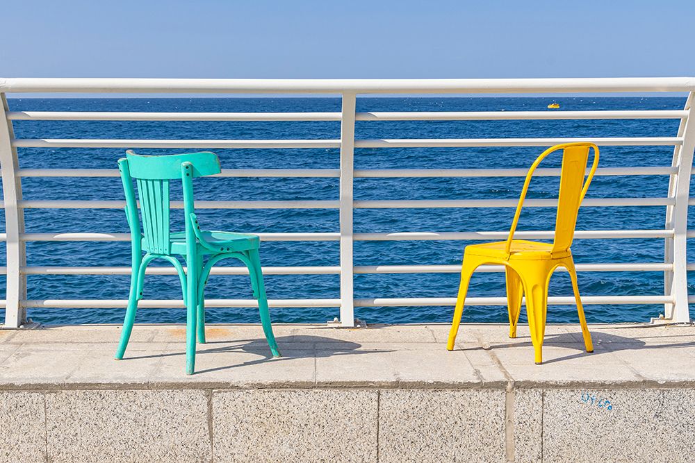 Saudi Arabia, Mecca Province, Jeddah. Colorful chairs on the waterfront of Jeddah. art print by Emily M. Wilson for $57.95 CAD
