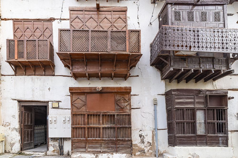 Saudi Arabia, Mecca, Jeddah, Al-Balad.Hijazi tower house with wooden Roshan windows and balconies. art print by Emily M. Wilson for $57.95 CAD