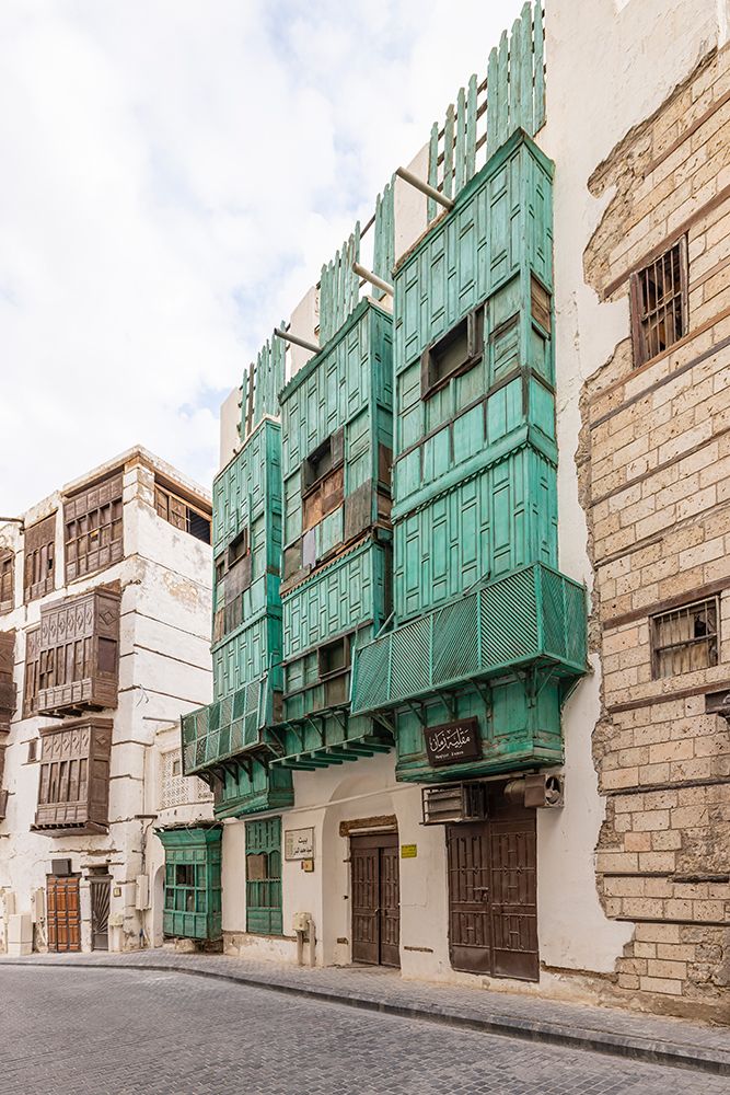 Saudi Arabia, Mecca, Jeddah, Al-Balad.Hijazi tower house with wooden Roshan windows and balconies. art print by Emily M. Wilson for $57.95 CAD