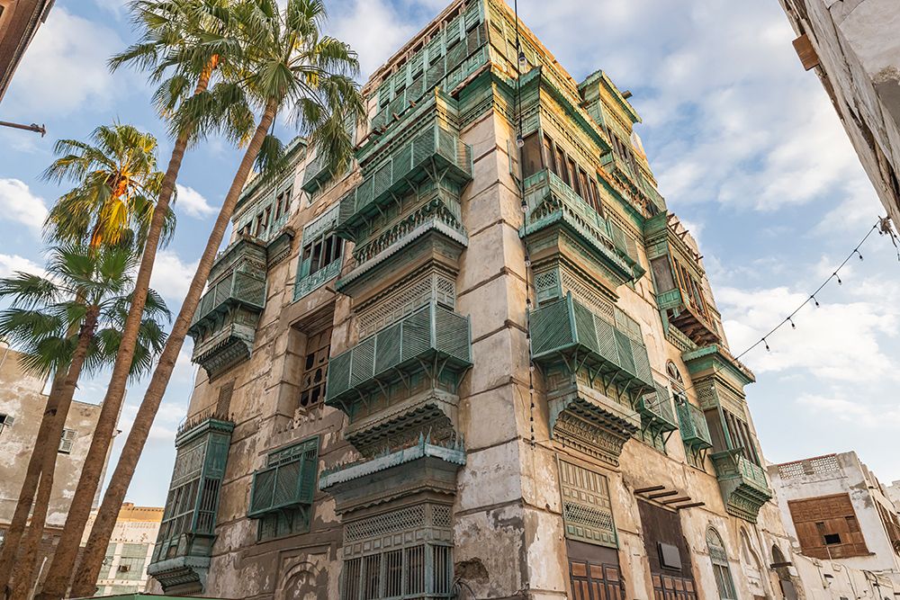 Saudi Arabia, Mecca, Jeddah, Al-Balad.Hijazi tower house with wooden Roshan windows and balconies. art print by Emily M. Wilson for $57.95 CAD