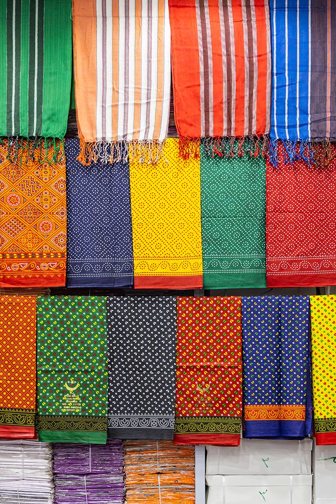 Saudi Arabia, Mecca, Jeddah, Al-Balad. Colorful cloth in the Al-Balad historical district of Jeddah art print by Emily M. Wilson for $57.95 CAD