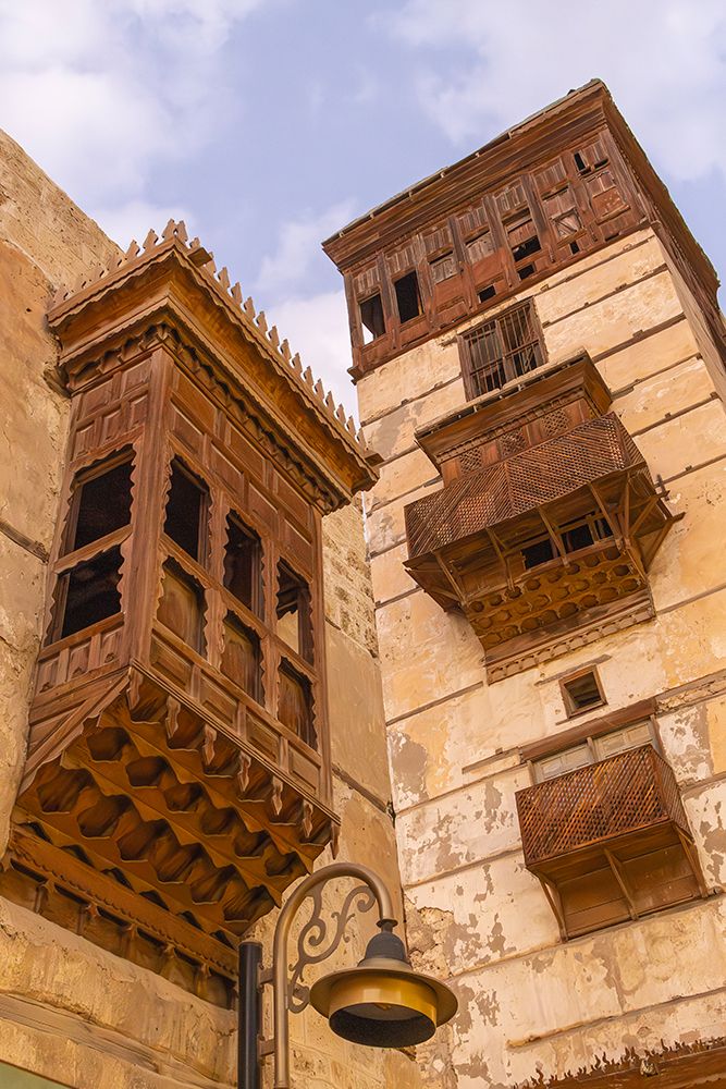Saudi Arabia, Mecca, Jeddah, Al-Balad.Hijazi tower house with wooden Roshan windows and balconies. art print by Emily M. Wilson for $57.95 CAD