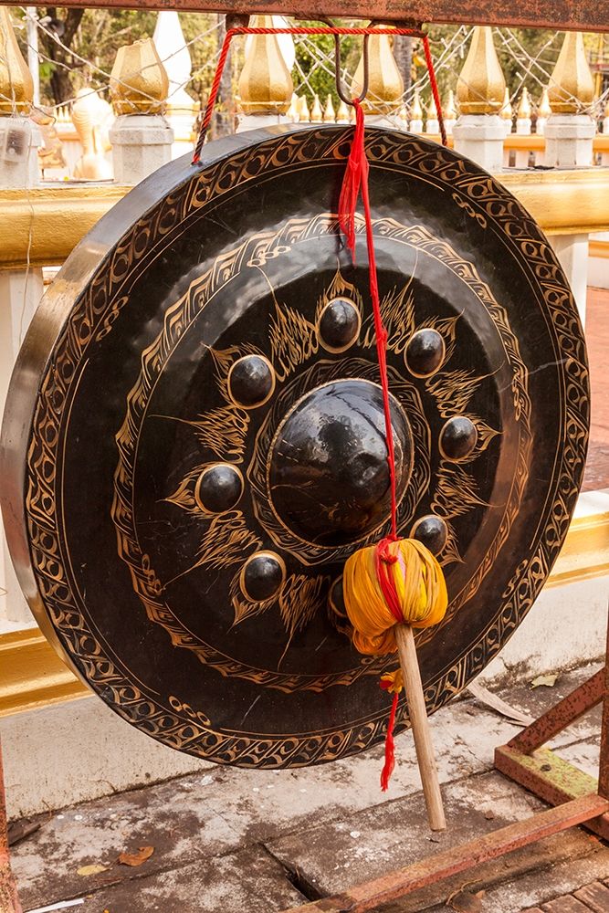 Thailand-Nong Khai Gong in temple courtyard Phra That Bang Phuan temple art print by Tom Haseltine for $57.95 CAD