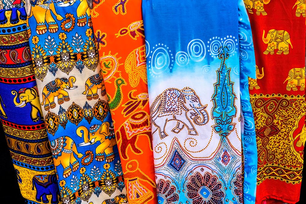 Colorful elephant pants souvenir, Bangkok, Thailand. Light and airy in hot climate. art print by William Perry for $57.95 CAD