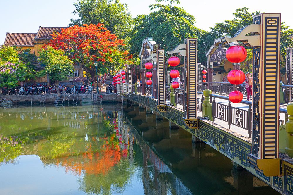 Vietnam-Hoi An bridge over the river with reflections and silk lamps art print by Tom Norring for $57.95 CAD