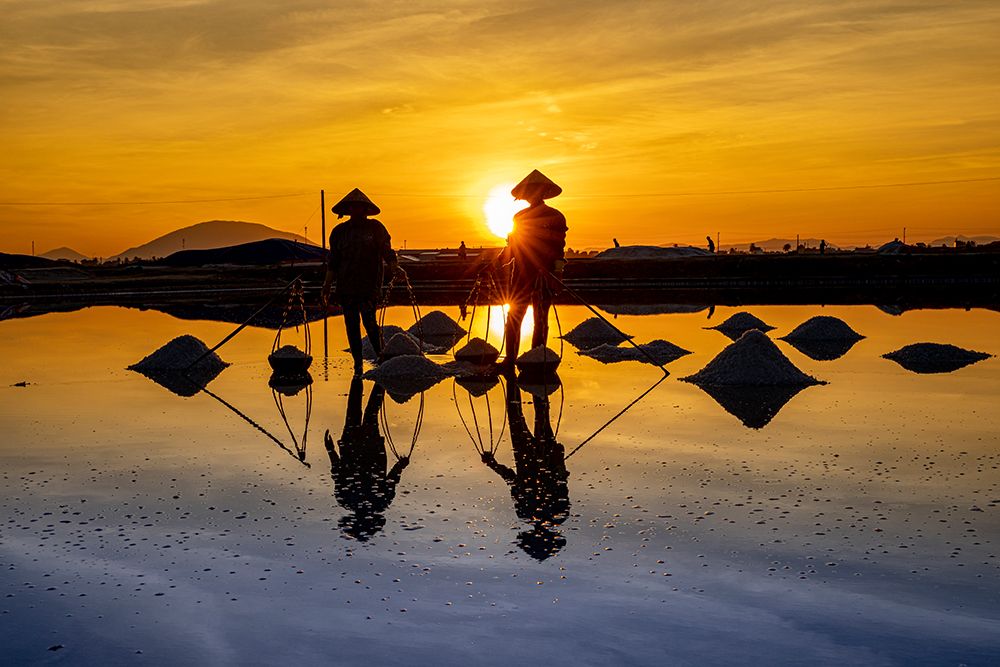Vietnam-Doc Let Salt lake-Workers harvesting the salt-Early morning sunrise art print by Tom Norring for $57.95 CAD