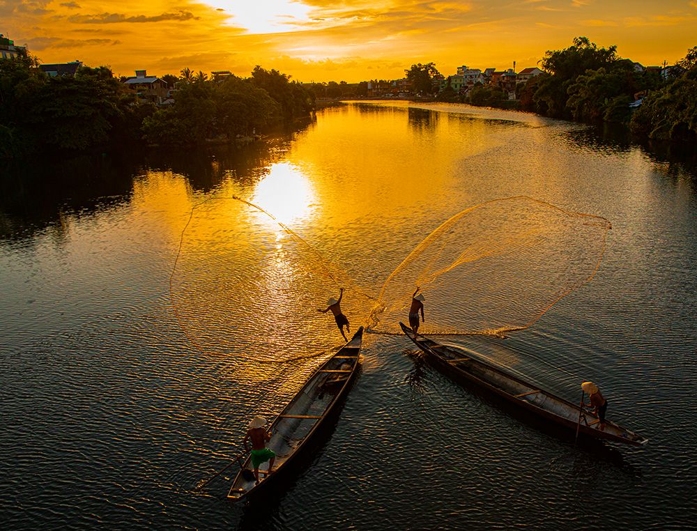 Vietnam-Coordinated lagoon fishing with nets at sunset art print by Tom Norring for $57.95 CAD