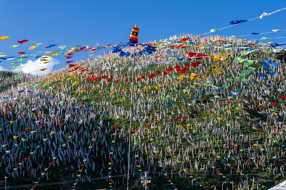 Tibet, Kham, Tagong. Hundreds of prayer flags above the Ser Gyergo nunnery. art print by Alison Wright for $57.95 CAD