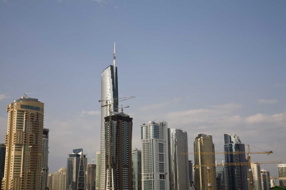 UAE, Dubai Construction amid skyscrapers art print by Bill Young for $57.95 CAD