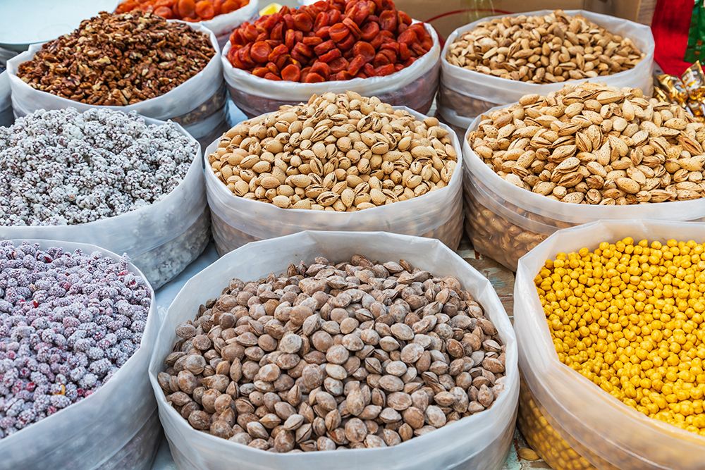 Tashkent, Uzbekistan, Central Asia. Pistachios and dried fruit at a market in Tashkent. art print by Emily M. Wilson for $57.95 CAD