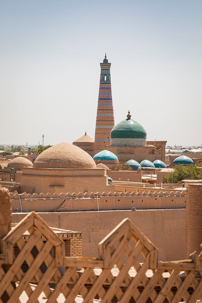 Khiva, Xorazm Region, Uzbekistan, Central Asia. Pahlavan Mahmoud Mausoleum and Islam Khoja Minaret. art print by Emily M. Wilson for $57.95 CAD