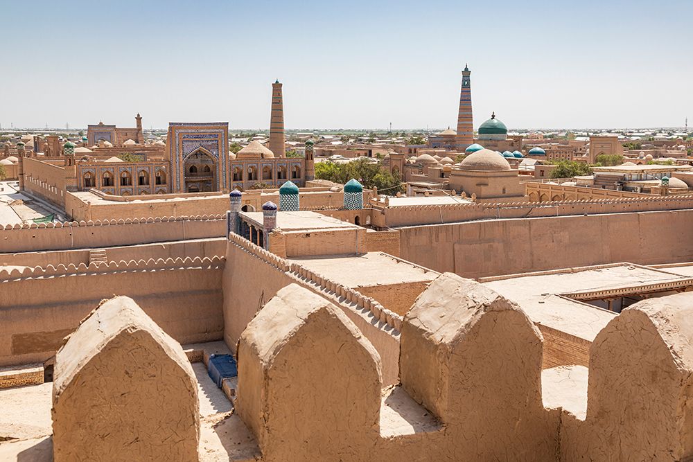 Khiva, Xorazm Region, Uzbekistan, Central Asia. The Islam Khodja Madrasa and Minaret. art print by Emily M. Wilson for $57.95 CAD