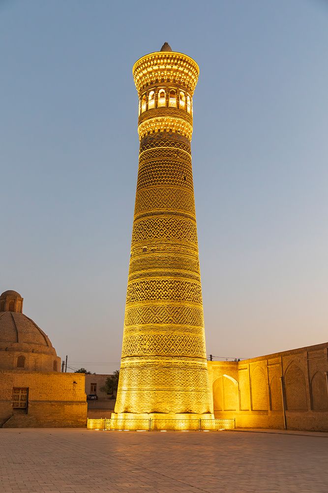 Bukhara, Uzbekistan, Central Asia. Night time view of the minaret at the Kalan Mosque in Bukhara. art print by Emily M. Wilson for $57.95 CAD