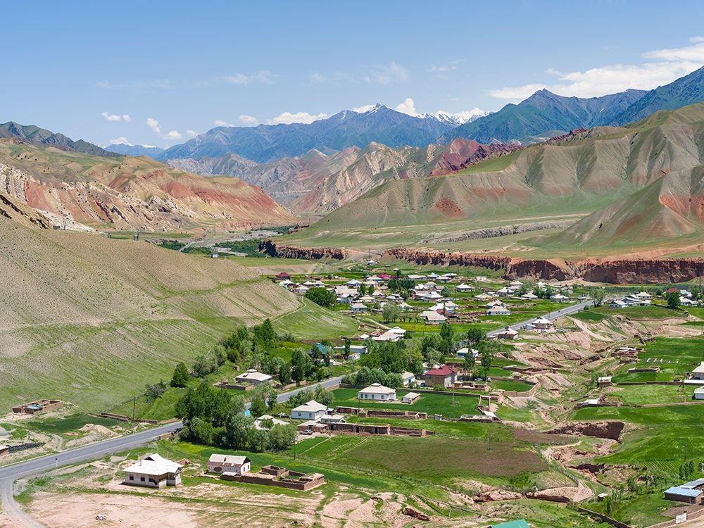 Village at the Pamir Highway The mountain range Tian Shan or Heavenly Mountains art print by Martin Zwick for $57.95 CAD