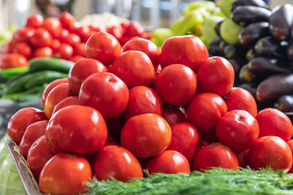 Dushanbe-Tajikistan Fresh tomatoes for sale at the Mehrgon Market in Dushanbe art print by Emily Wilson for $57.95 CAD