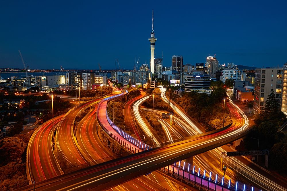 Motorways-Lightpath cycleway-and Skytower at dusk-Auckland-North Island-New Zealand art print by David Wall for $57.95 CAD