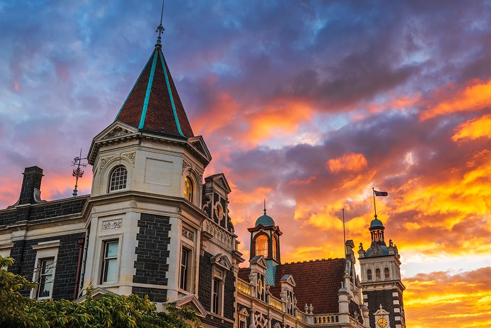 Sunset over the Dunedin Railway Station-Dunedin-South Island-New Zealand art print by Russ Bishop for $57.95 CAD