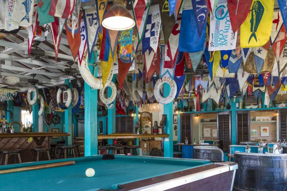 Bahamas, Exuma Island Flags on ceiling of bar art print by Don Paulson for $57.95 CAD