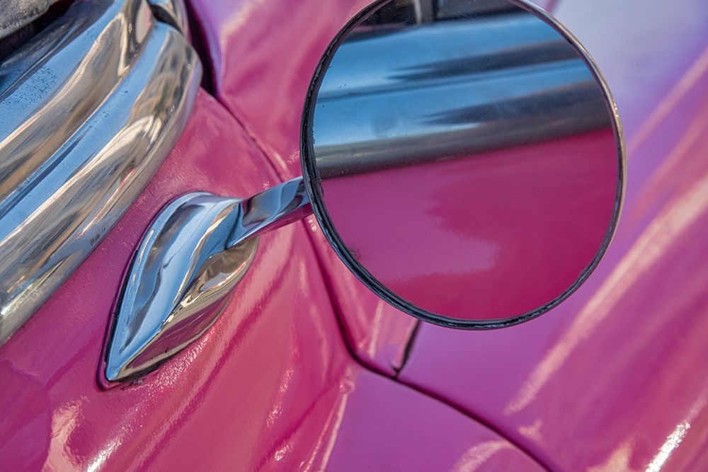 Close-up side mirror on hot pink classic American Oldsmobile in Vieja-old Habana-Havana-Cuba art print by Janis Miglavs for $57.95 CAD