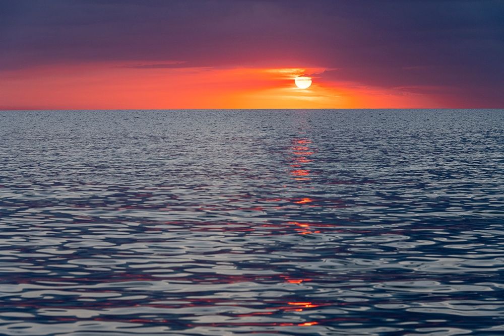 Sunset sky with clouds over ocean seen from La Boca-Cuba art print by Janis Miglavs for $57.95 CAD