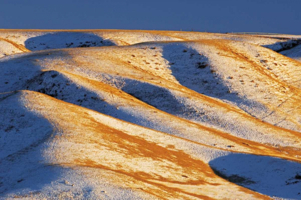 Canada, Alberta, Snow-covered hills at sunset art print by Mike Grandmaison for $57.95 CAD