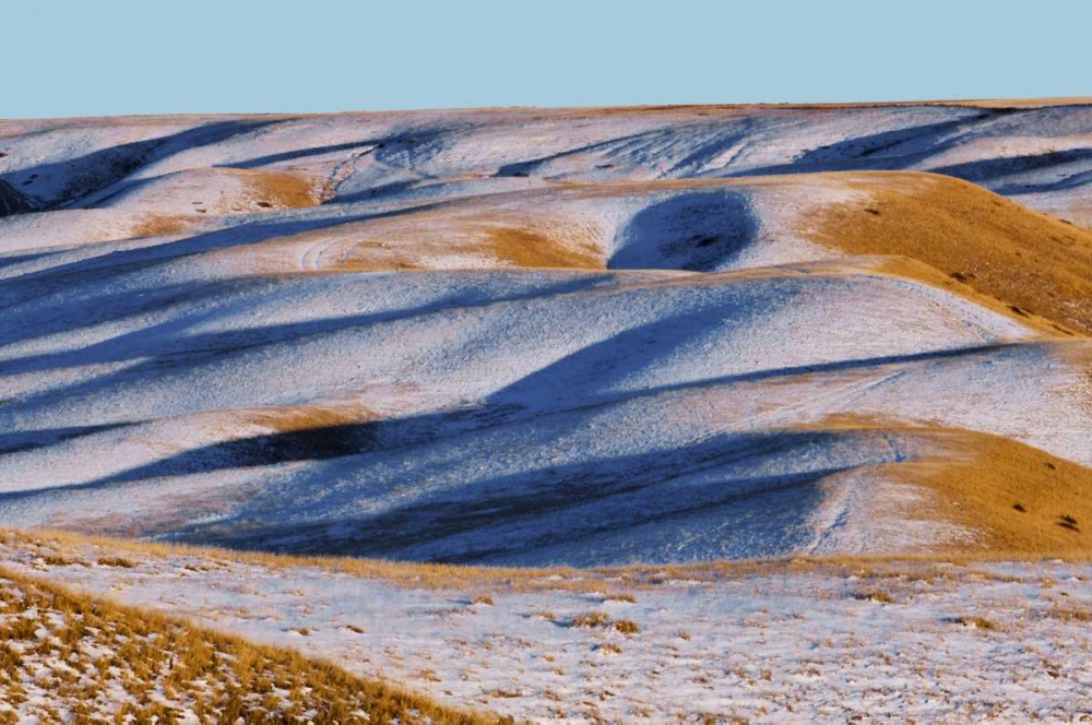 Canada, Alberta, Snow-covered hills at sunset art print by Mike Grandmaison for $57.95 CAD