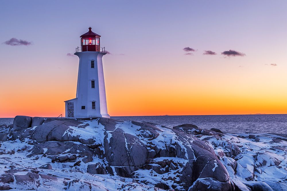 Peggys Cove Lighthouse in winter at sunset, Nova Scotia, Canada. art print by Richard and Susan Day for $57.95 CAD