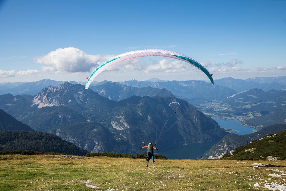 Austria-Dachstein-Paragliders as they prepare to take off above Lake Hallstatt art print by Hollice Looney for $57.95 CAD