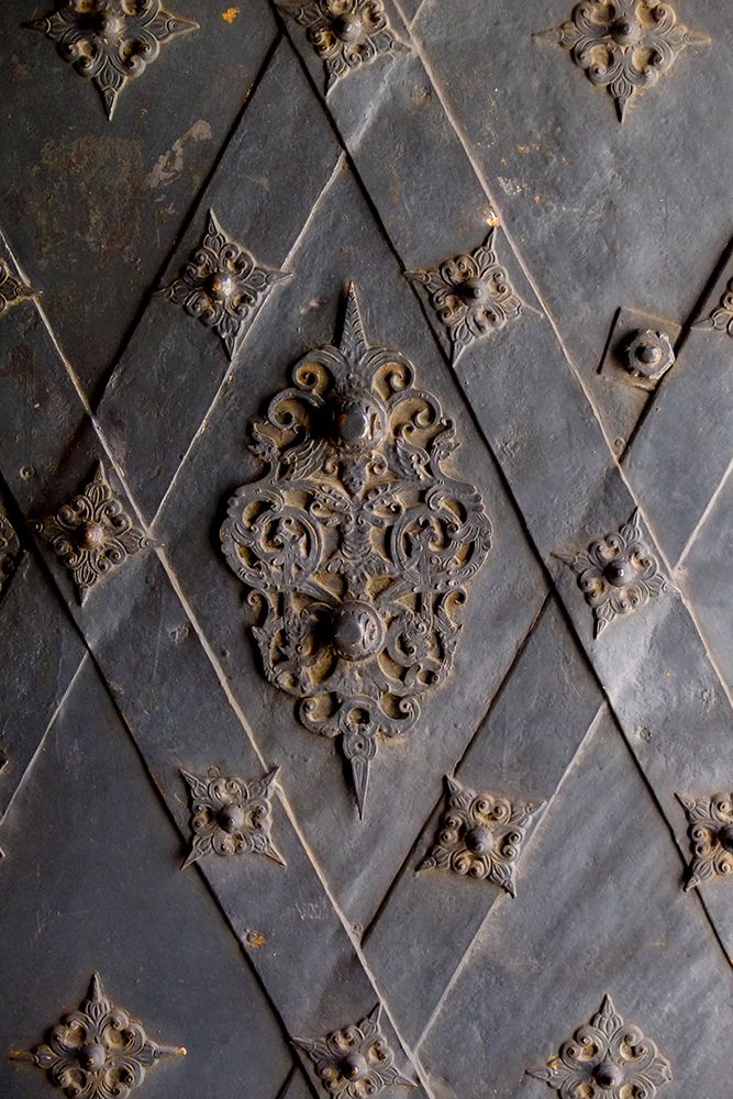 Vienna, Austria. Ancient wood door covered in metal art print by Julien McRoberts for $57.95 CAD