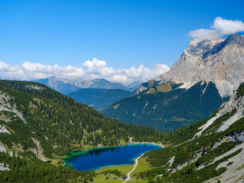 Lake Seeben See view towards Ammergau Alps, Wetterstein range and Mt. Zugspitze. Austria, Tyrol art print by Martin Zwick for $57.95 CAD