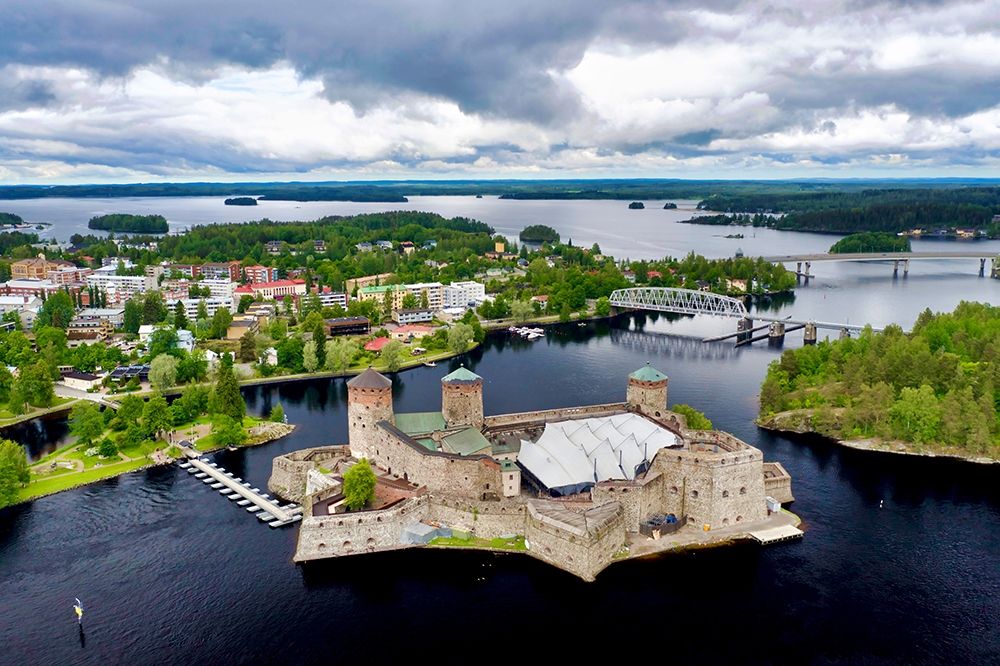 Finlandia-Savonlinna-Savonlinna castle and town art print by Michele Molinari for $57.95 CAD