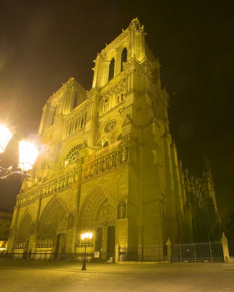 France, Paris Notre Dame Cathedral lit at night art print by Jim Zuckerman for $57.95 CAD