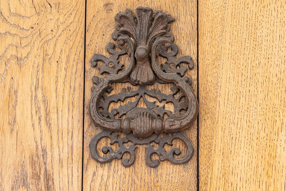 Aigues-Mortes-Gard-Occitania-France An old rusted knocker on a wooden door art print by Emily M. Wilson for $57.95 CAD