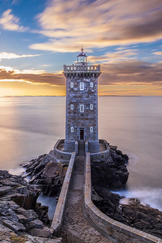 France-Brittany-Le Conquet Sun setting at the Kermorvan Lighthouse art print by Hollice Looney for $57.95 CAD