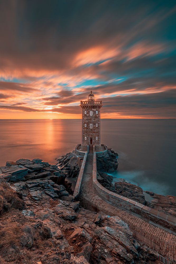 France-Brittany-Le Conquet Sun setting at the Kermorvan Lighthouse art print by Hollice Looney for $57.95 CAD