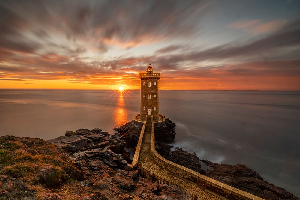 France-Brittany-Le Conquet Sun setting at the Kermorvan Lighthouse art print by Hollice Looney for $57.95 CAD