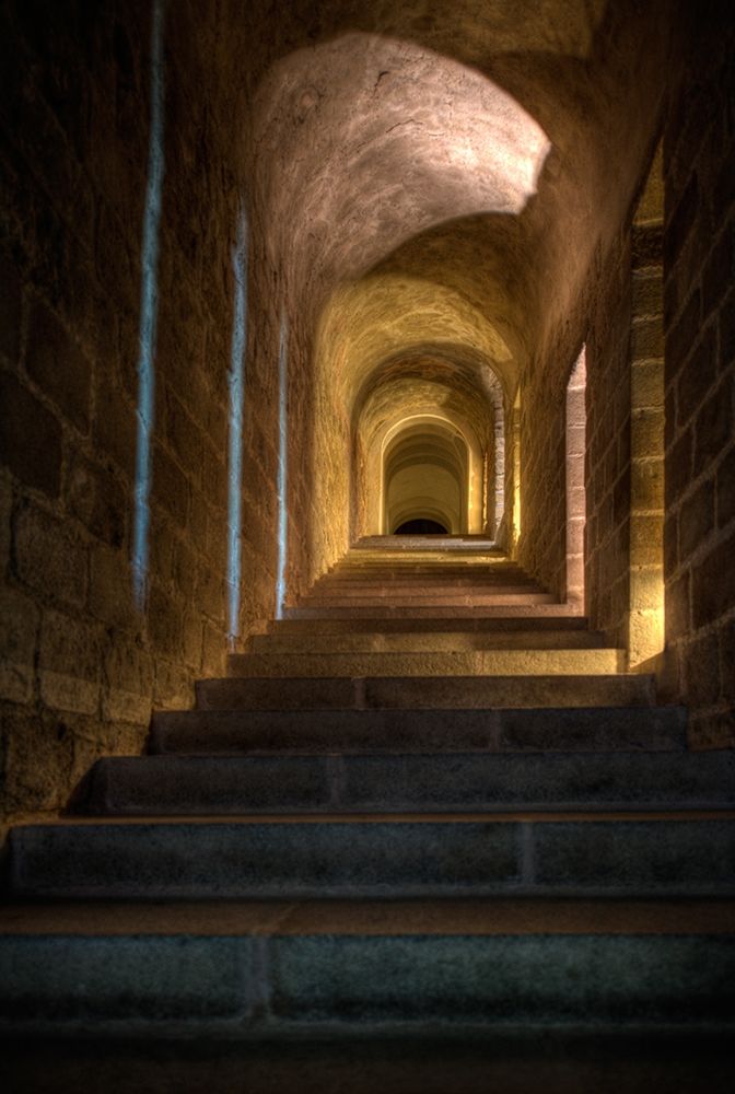 Stairs and hallway in Mont Saint-Michel on the Normandy coast of France art print by Steve Mohlenkamp for $57.95 CAD