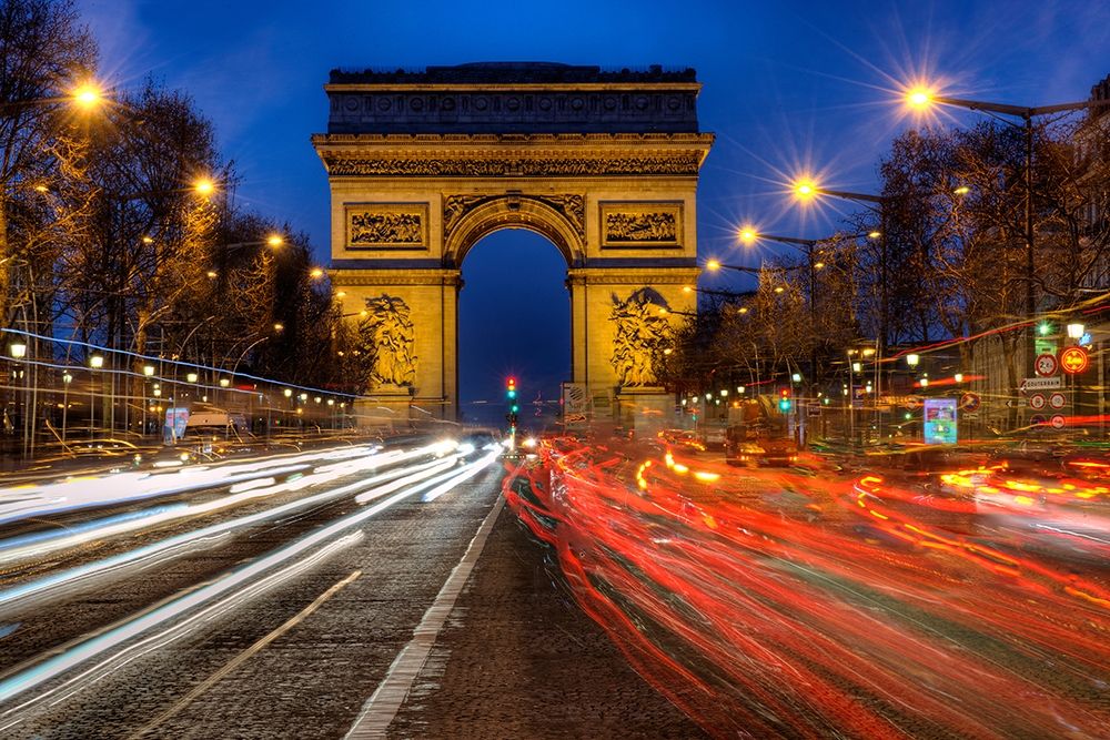 Traffic passes the Arch de Triumph on the Champs Elysee in Paris-France art print by Steve Mohlenkamp for $57.95 CAD