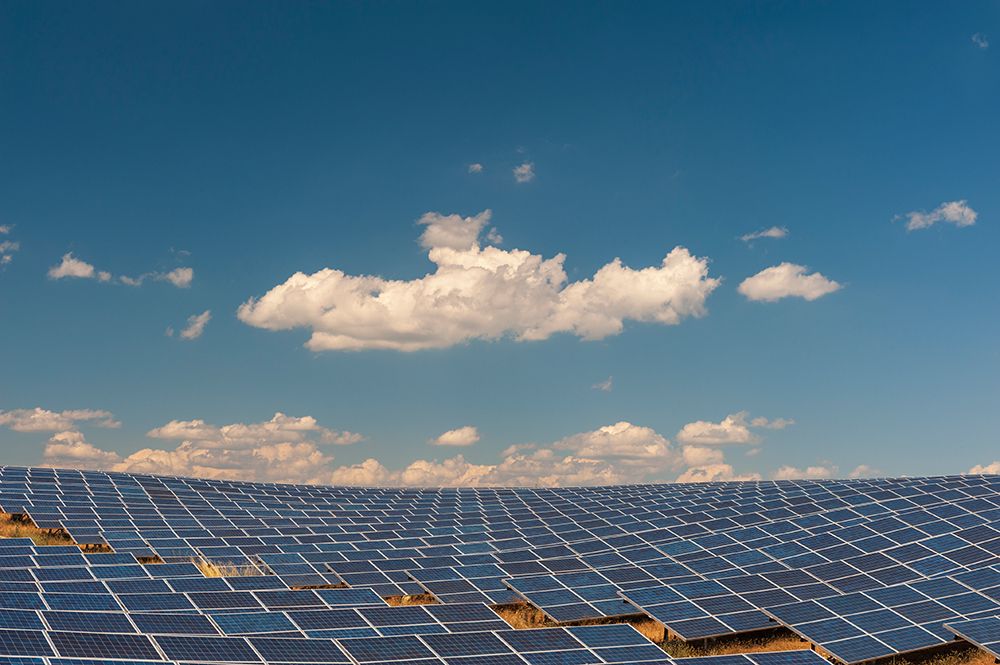 A field of solar panels at a solar power plant under a blue sky Les Mees-Provence-France art print by Sergio Pitamitz for $57.95 CAD