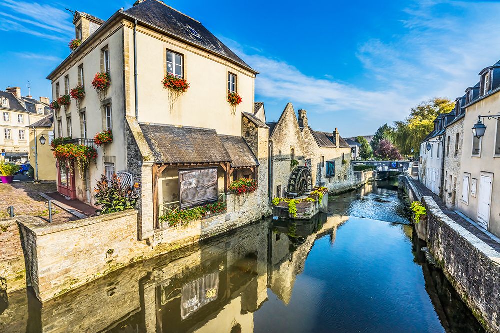 Colorful old buildings- Aure River reflection- Bayeux- Normandy- France art print by William Perry for $57.95 CAD