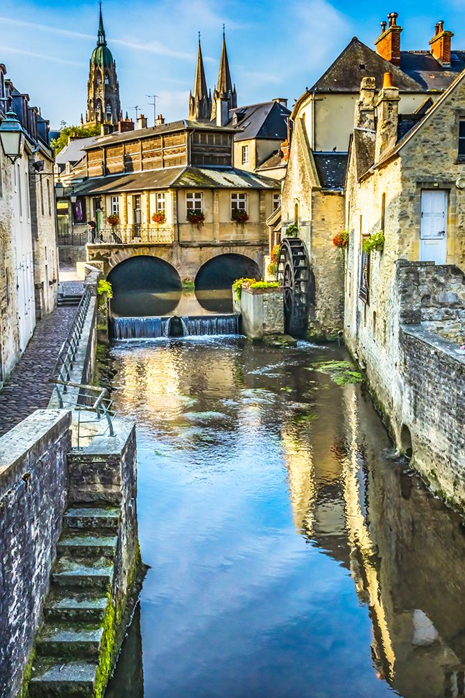 Colorful old buildings- Aure River reflection- Bayeux- Normandy- France art print by William Perry for $57.95 CAD