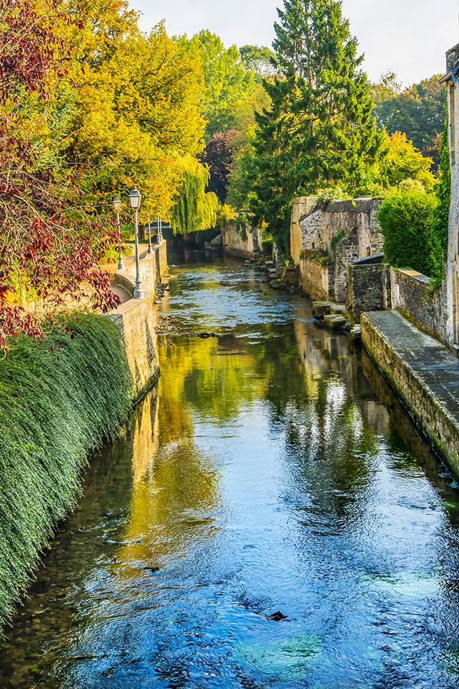 Colorful old buildings- Aure River reflection- Bayeux- Normandy- France art print by William Perry for $57.95 CAD