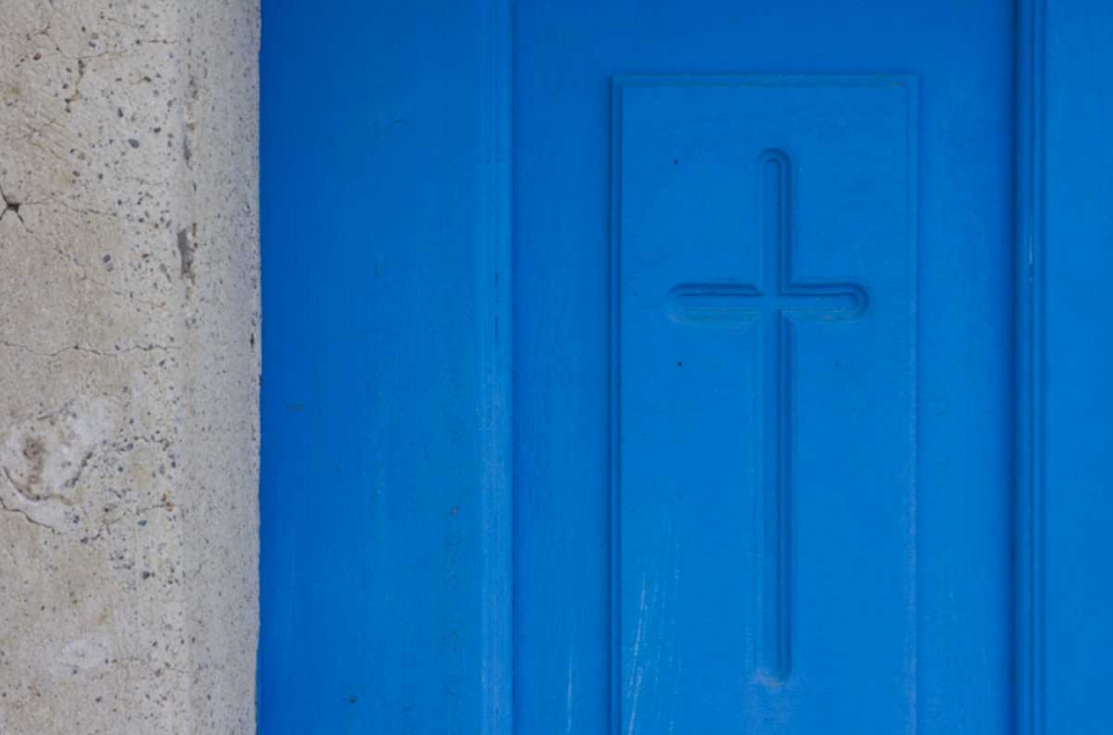 Greece, Oia Christian cross engraved in a door art print by Bill Young for $57.95 CAD