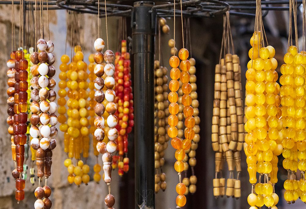 Greece, Crete, Chania, Old Town. Necklaces for sale. art print by Emily M. Wilson for $57.95 CAD