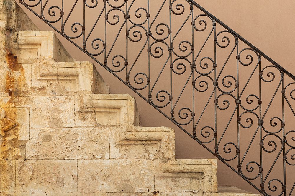 Stone staircase with ornate wrought iron balustrade. Greece, Crete, Chania. art print by Emily M. Wilson for $57.95 CAD