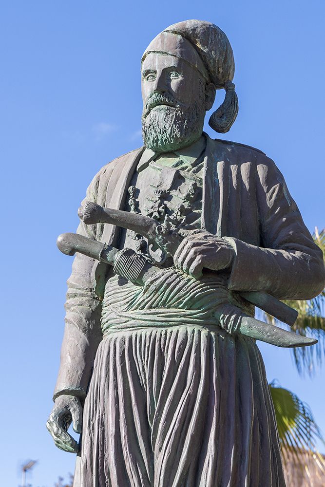 Greece, Crete, Chania. Statue of Anagnostis Mantakas, Greek freedom fighter. art print by Emily M. Wilson for $57.95 CAD