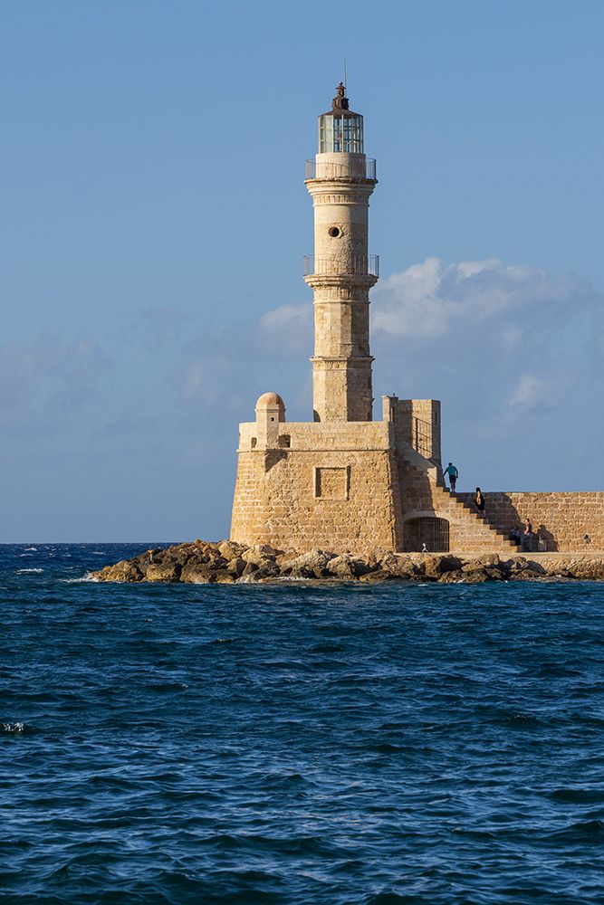 Greece, Crete, Chania harbor, old town. Chania Lighthouse. art print by Emily M. Wilson for $57.95 CAD